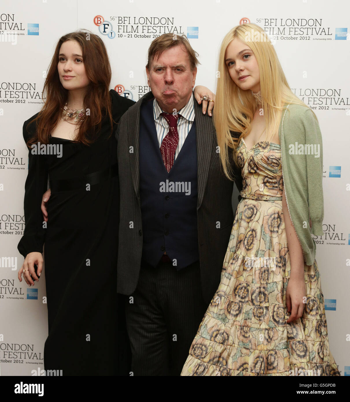 Timothy Spall, Elle Fanning (right) and Alice Englert (left) arriving for the BFI London Film Festival premiere of Ginger And Rosa at the Odeon West End, in Leicester Square, London. Stock Photo
