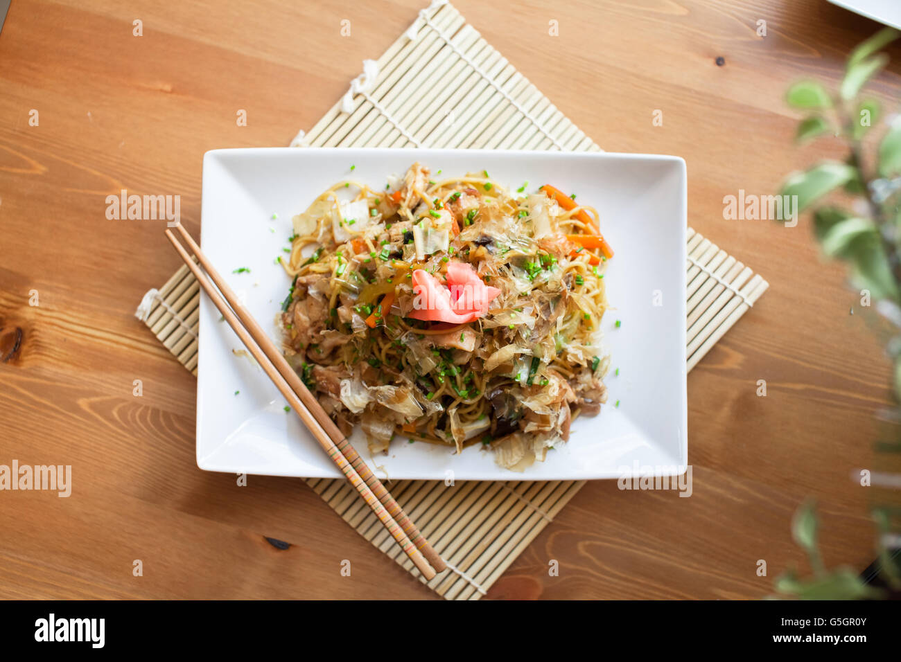 Yakisoba noodles topped with katsuobushi and ginger Stock Photo