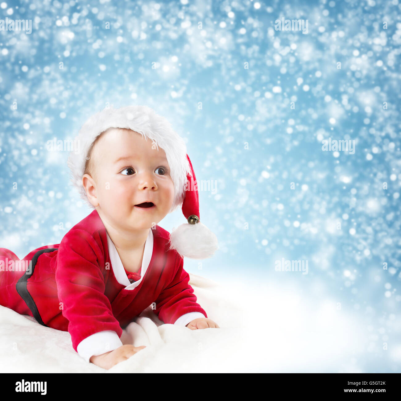 Eight month old baby lying on soft blanket Stock Photo Alamy