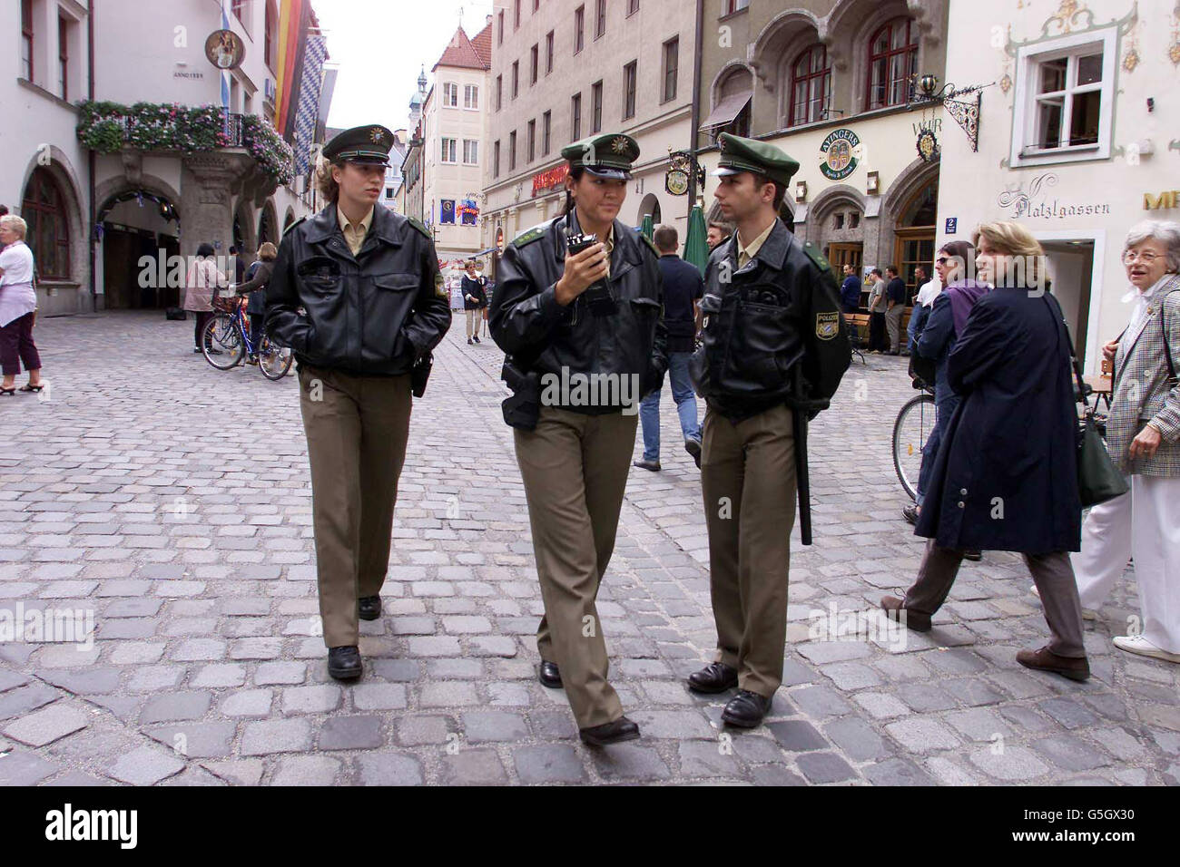 German Police patrol the centre of Munich before the England v Germany football match. In England, police are attempting to stop known troublemakers from travelling to England's World Cup qualifying match against Germany in an attempt to stop trouble in Munich. Stock Photo