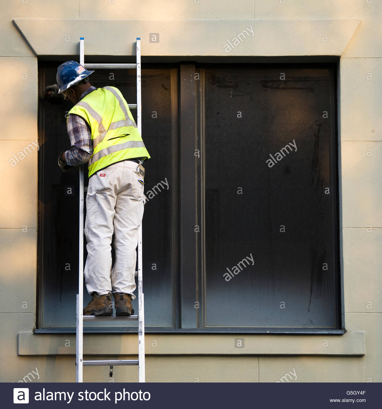 Window Cleaning Ladder Stock Photos & Window Cleaning Ladder Stock
