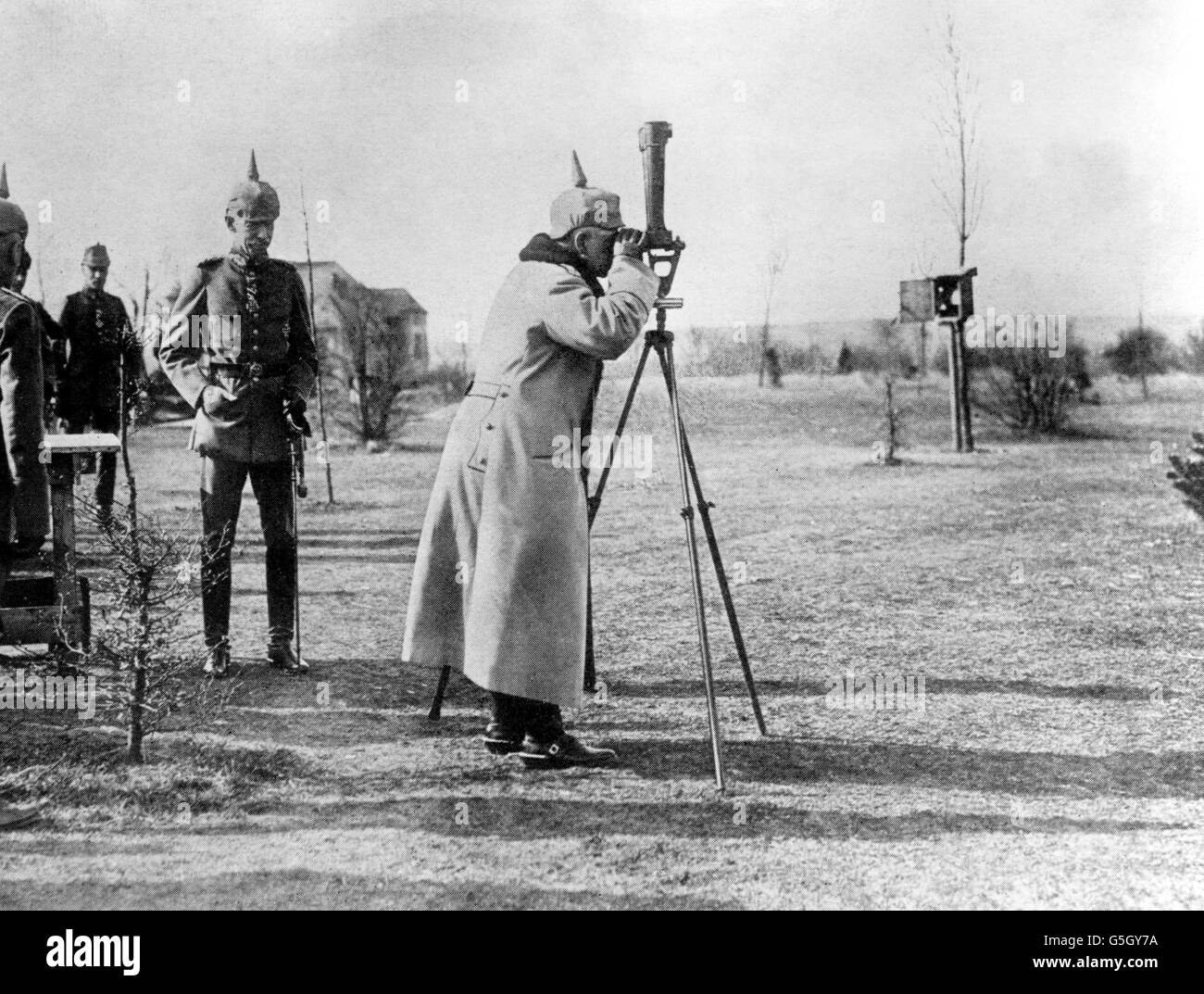 Kaiser Wilhelm II observes the enemy's position through a telescope. Stock Photo