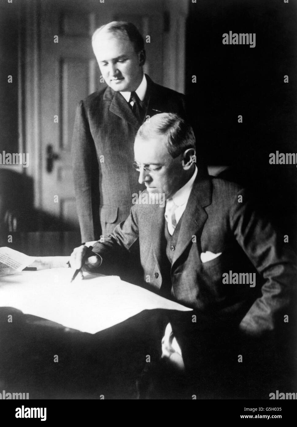American President Woodrow Wilson and his secretary Joseph Tumulty in the White House. Stock Photo