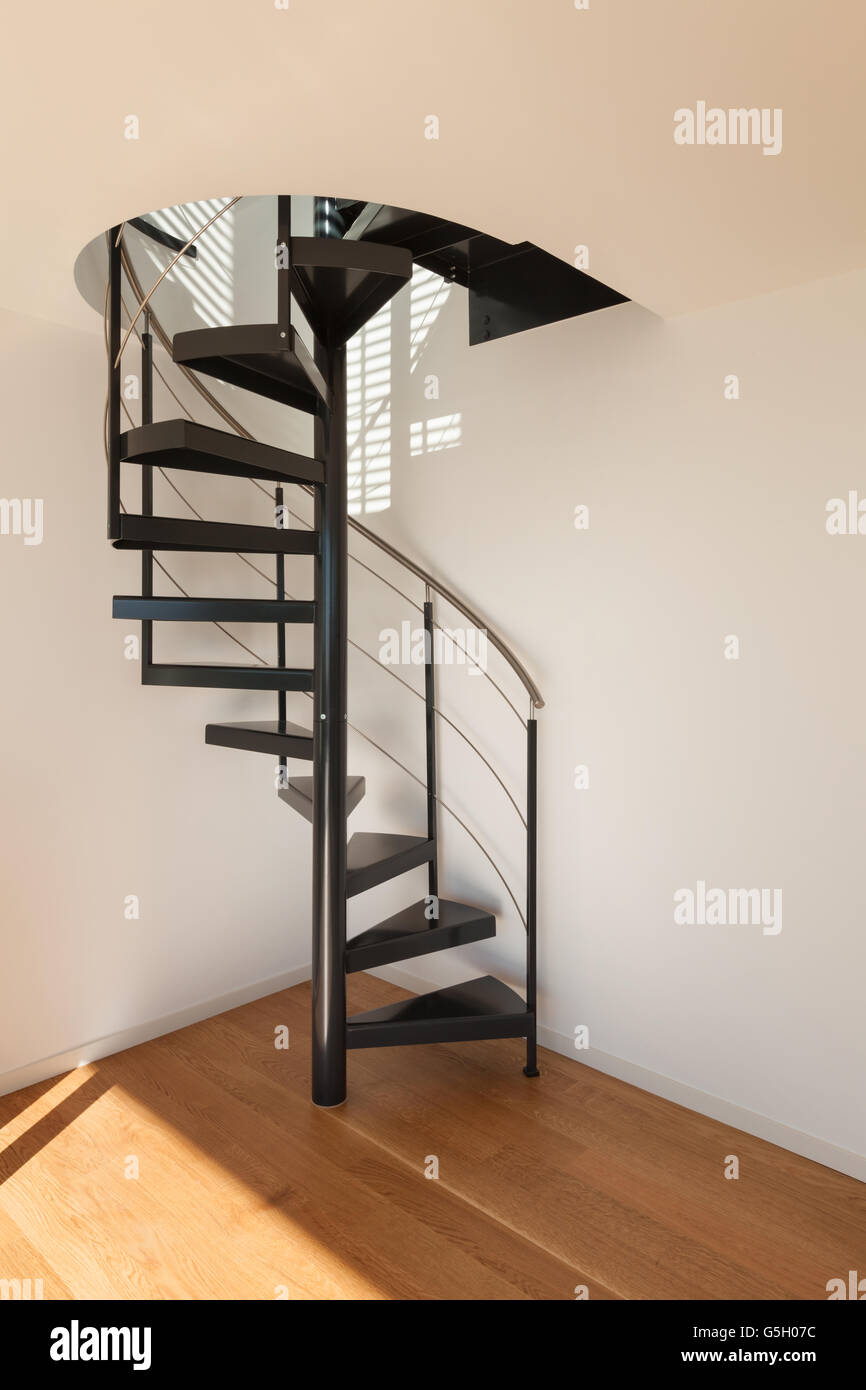 Interior, spiral staircase of a modern loft Stock Photo