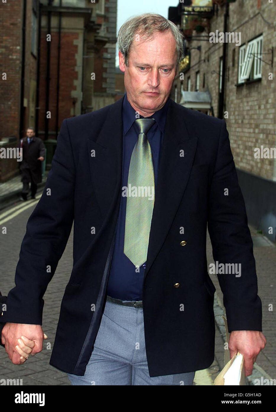 Dennis Yates, 58, of No Man's Lane, Sandiacre, Nottinghamshire, leaves Aylesbury Crown Court after pleading guilty to stealing the Enigma machine. * The former dealer in Second World War memorabilia admitted the charge of handling the Abwehr Enigma G312 machine, worth 100,000, between 31 March 2000 and 19 November 2000 with a separate charge of blackmailing Christine Large, the director of Bletchley Park, Buckinghamshire, where the machine was kept, being ordered to lie on file. The encoding machine was stolen from a display cabinet at Bletchley Park on April 1 last year during an open day at Stock Photo