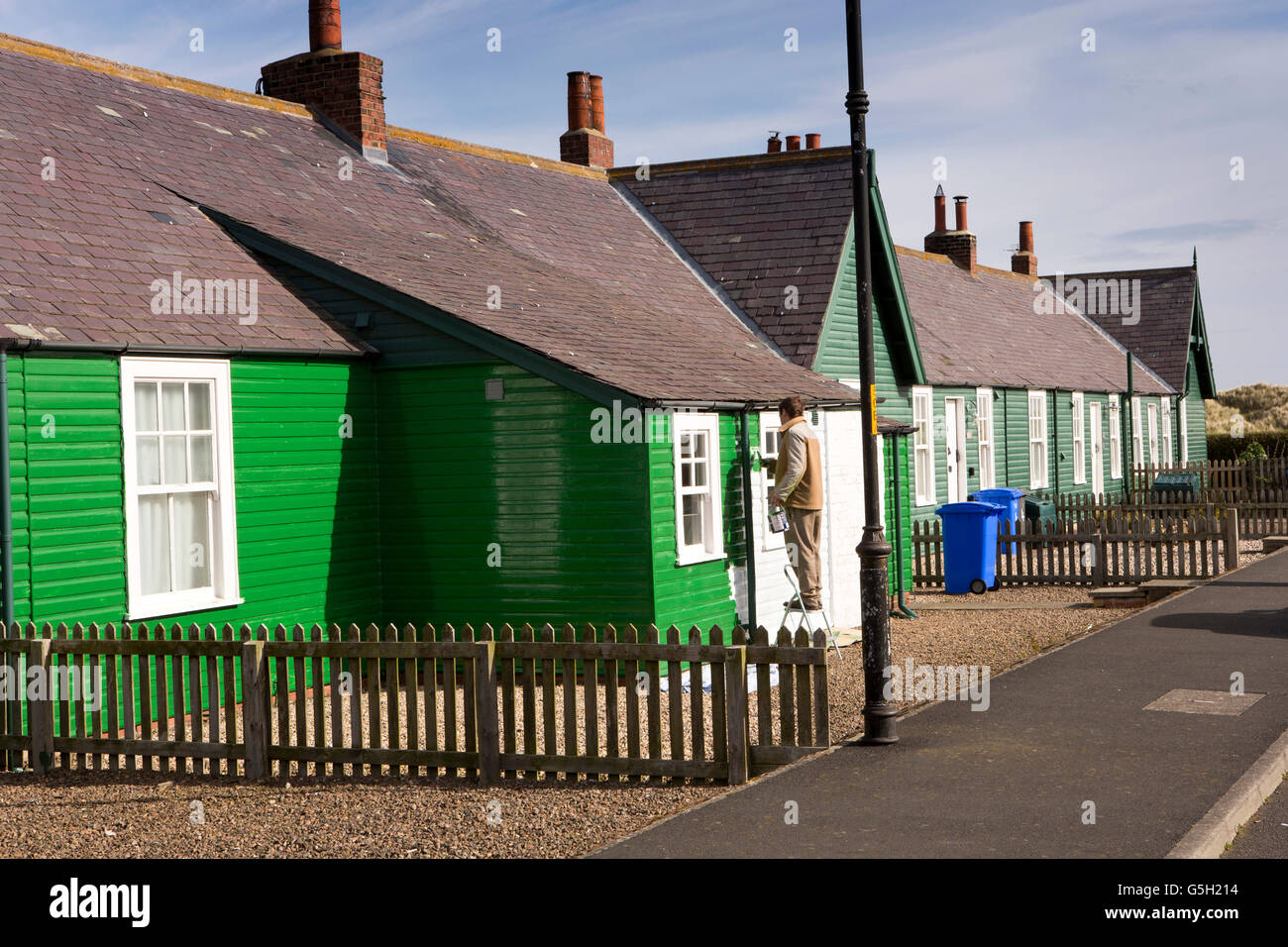 UK, England Northumberland, Bamburgh, Armstrong cottages, part of the estate originally built by Lord Armstrong for workmen Stock Photo