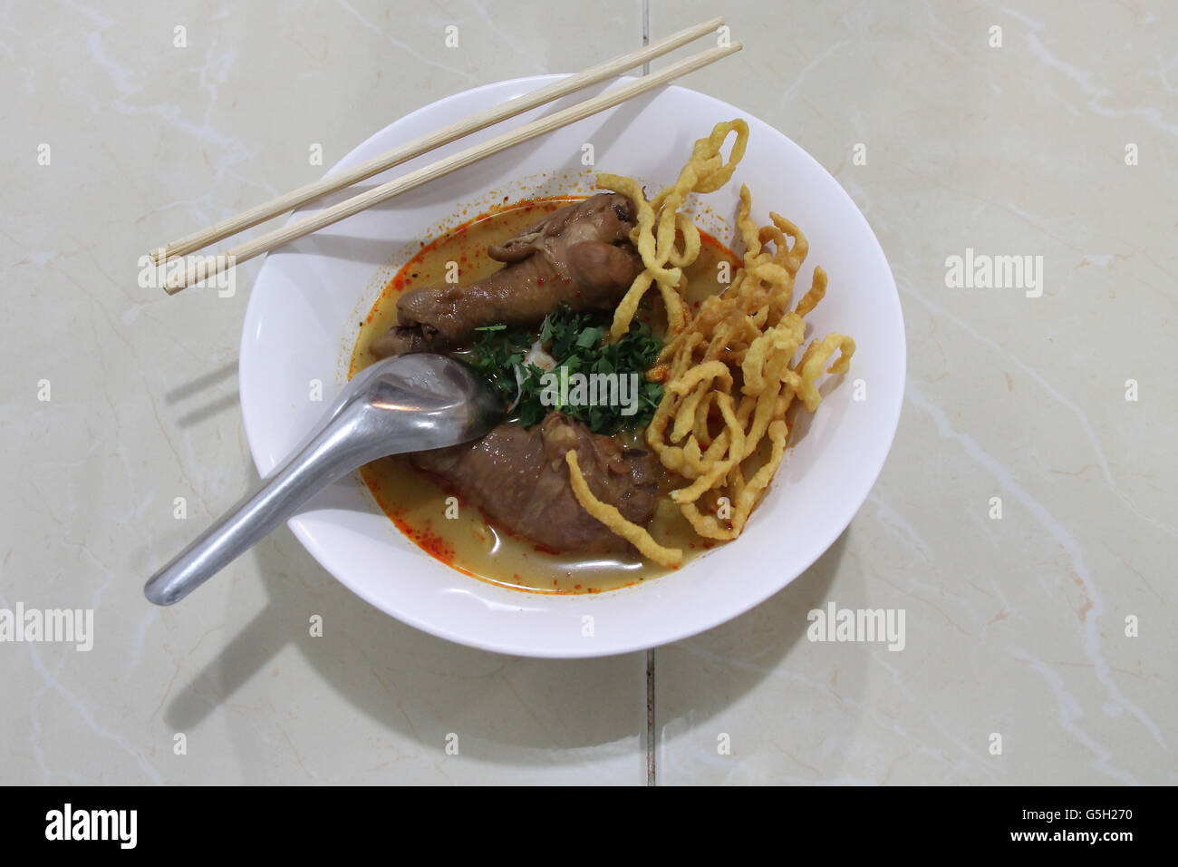 Typical Thai dish in a restaurant in Chiang Mai (Thailand). Stock Photo