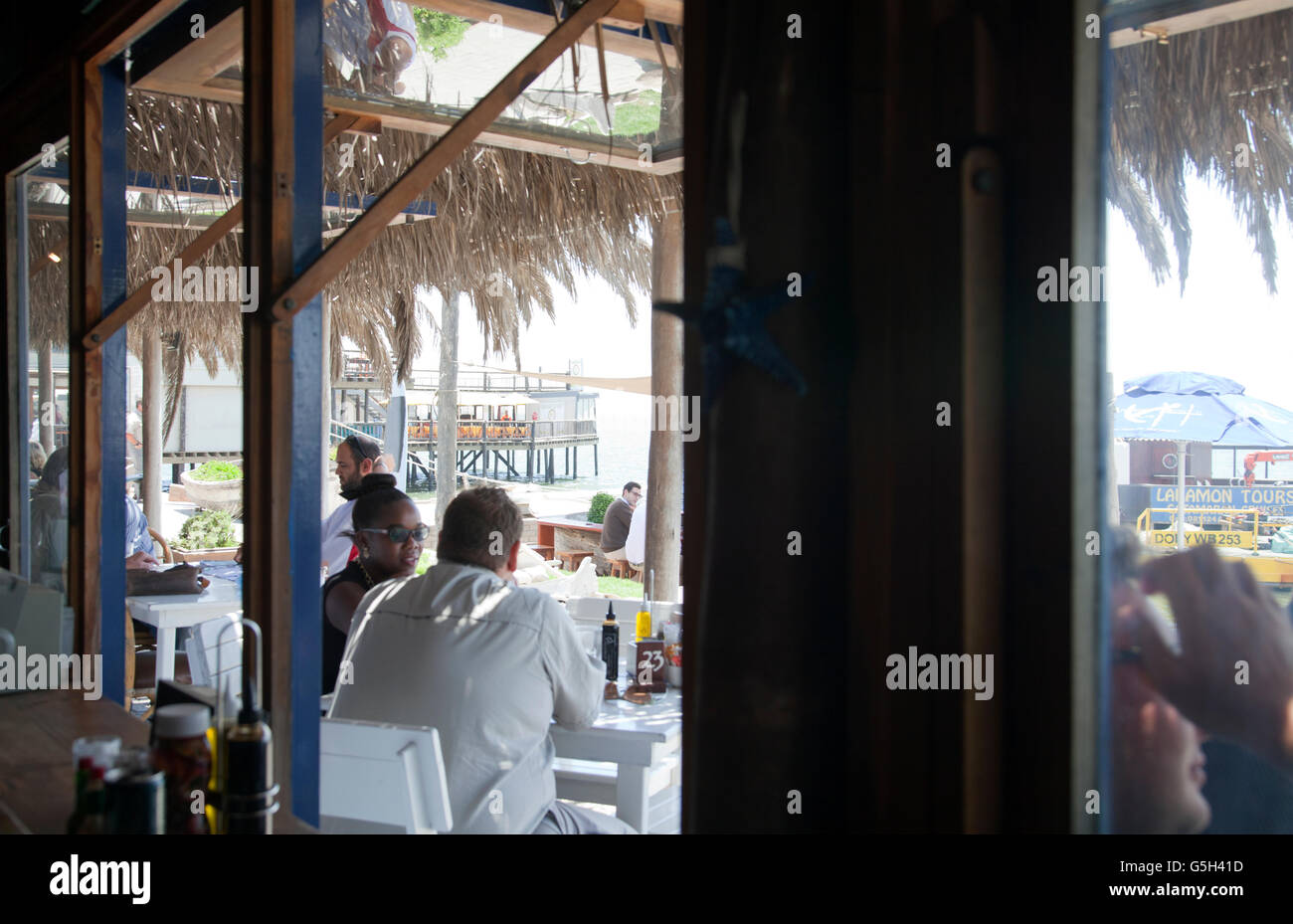 Anchors Restaurant with Diners on Walvis Bay waterfront in Namibia