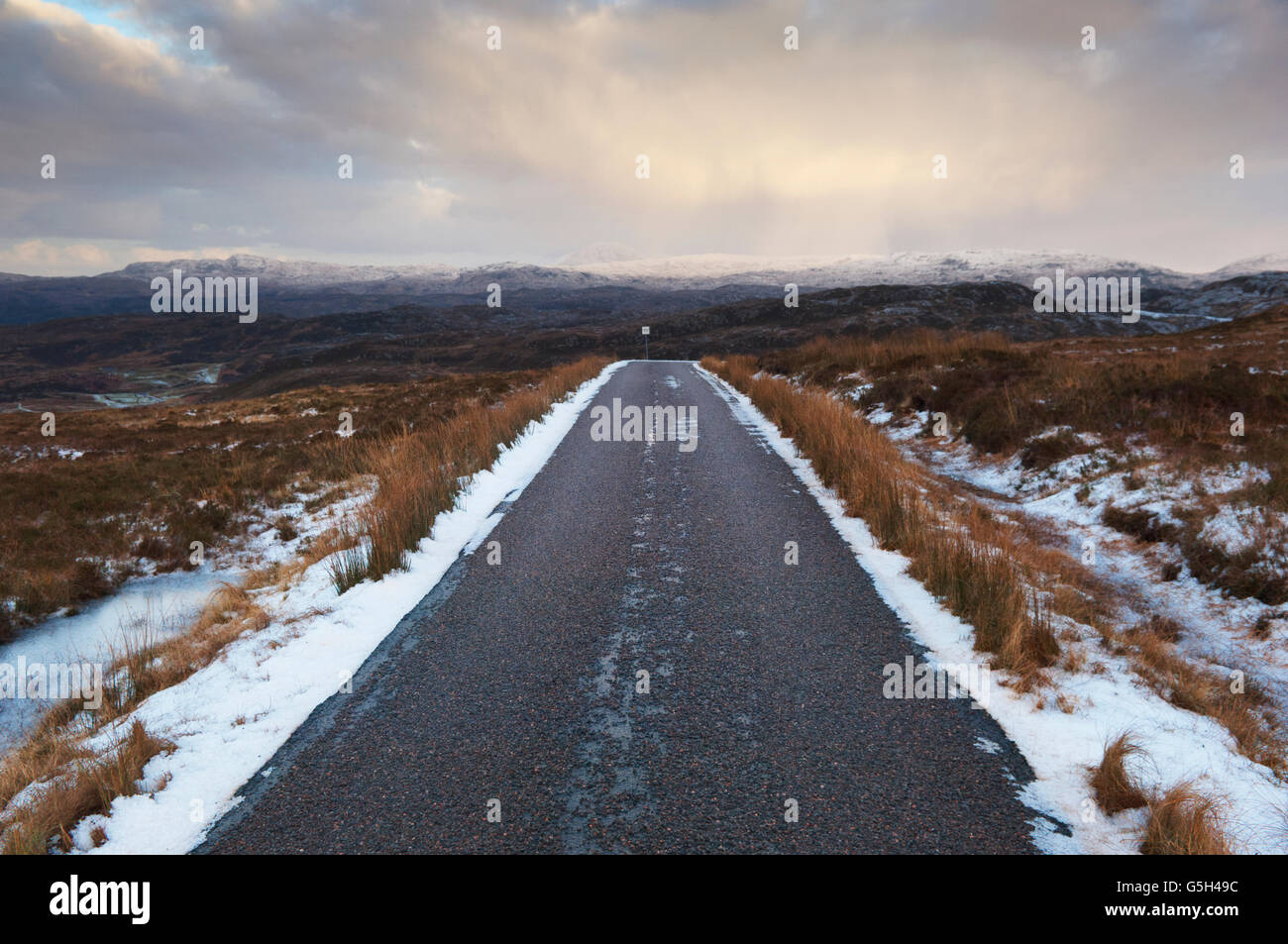 Remote Highland road in winter - Sutherland, Scotland. This road is part of the North Coast 500 Route Stock Photo