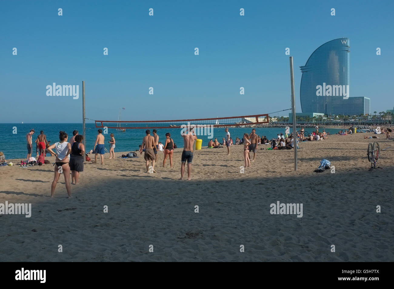 volleyball on the beach in barcelona, spain. W Hotel in
