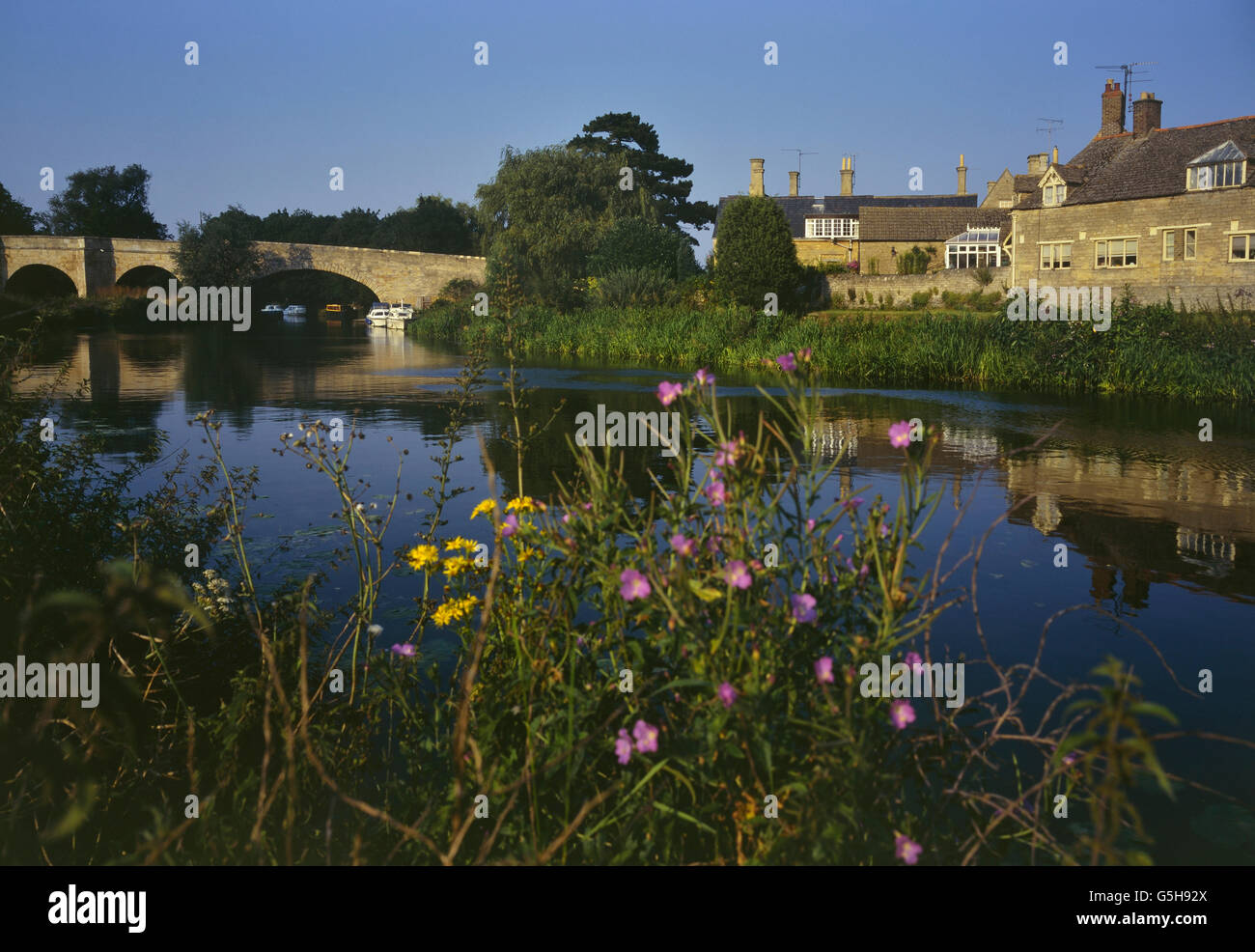 Wansford village viewed from the river Nene. Cambridgeshire. England. UK Stock Photo