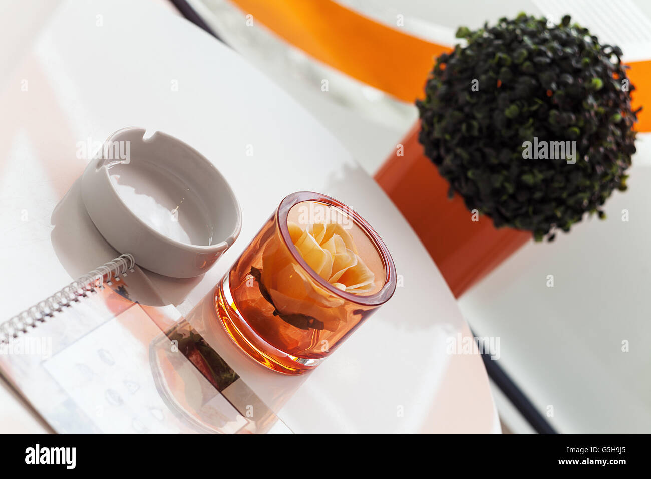 Just a detail from a cafe, white table with menu. Stock Photo