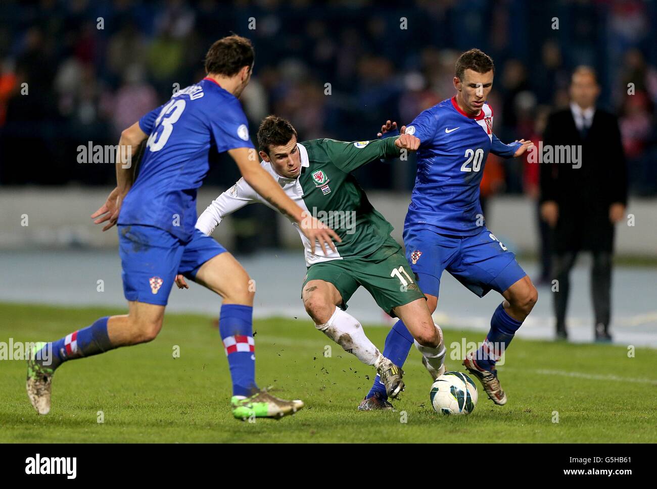 Soccer - 2014 FIFA World Cup - Qualifier - Group A - Croatia v Wales - Stadion Maksimir. Wales' Gareth Bale (centre) and Croatia's Ivan Perisic (right) in action Stock Photo