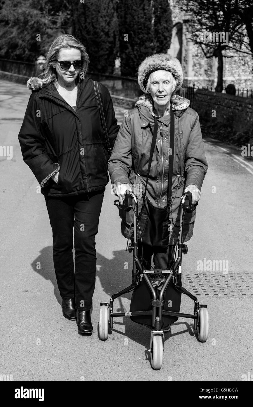 Elderly woman walker and carer uk hi-res stock photography and images ...