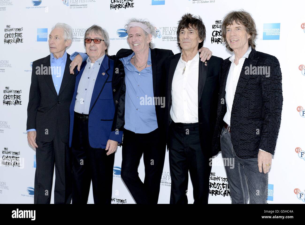(L-R) Charlie Watts, Bill Wyman, Keith Richards, Ronnie Wood and Mick Jagger arrive to attend the gala screening of 'Crossfire Hurricane, Odeon Leicester Square, London. Stock Photo