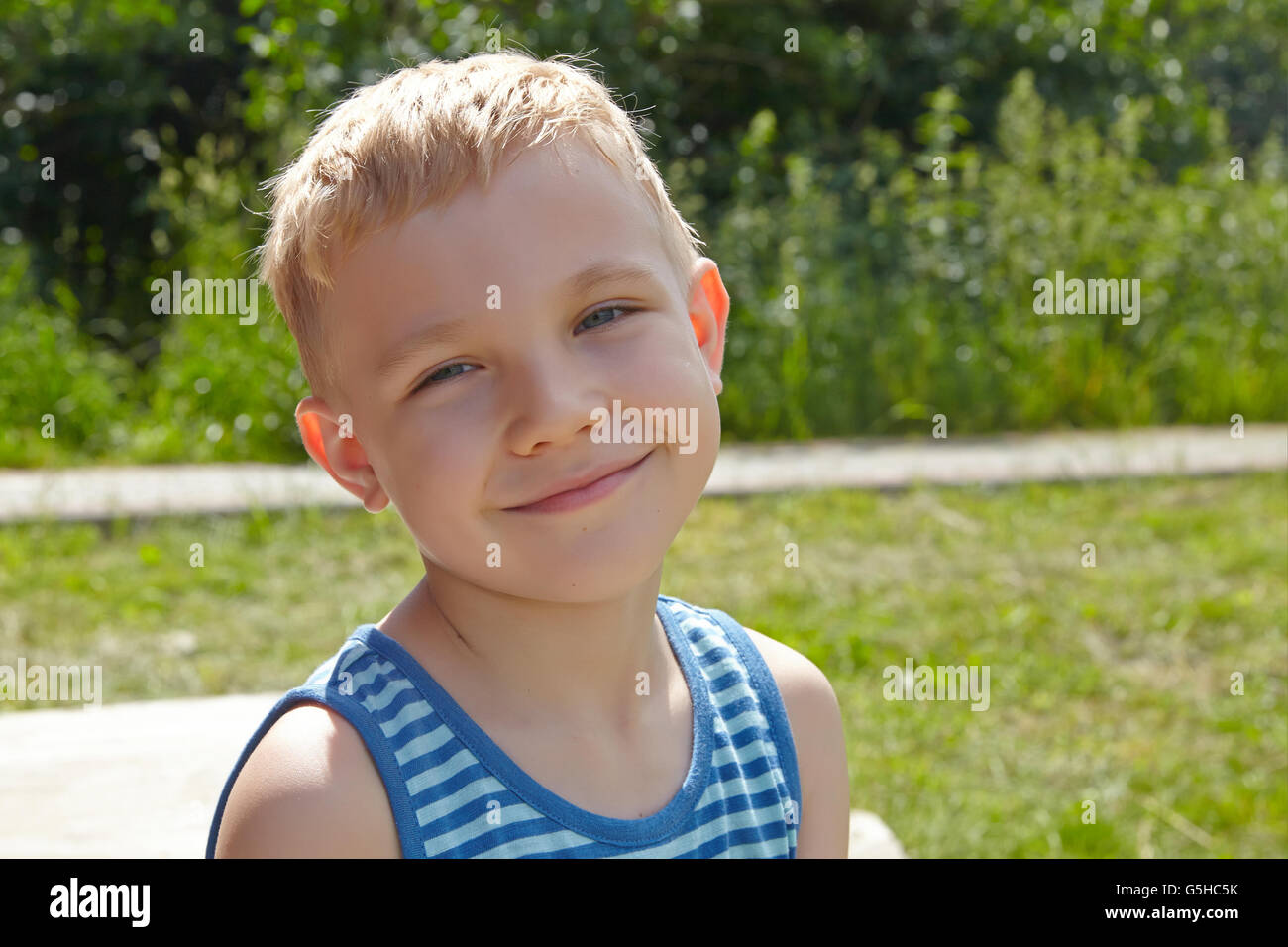 Adorable boy portrait outdoors Stock Photo