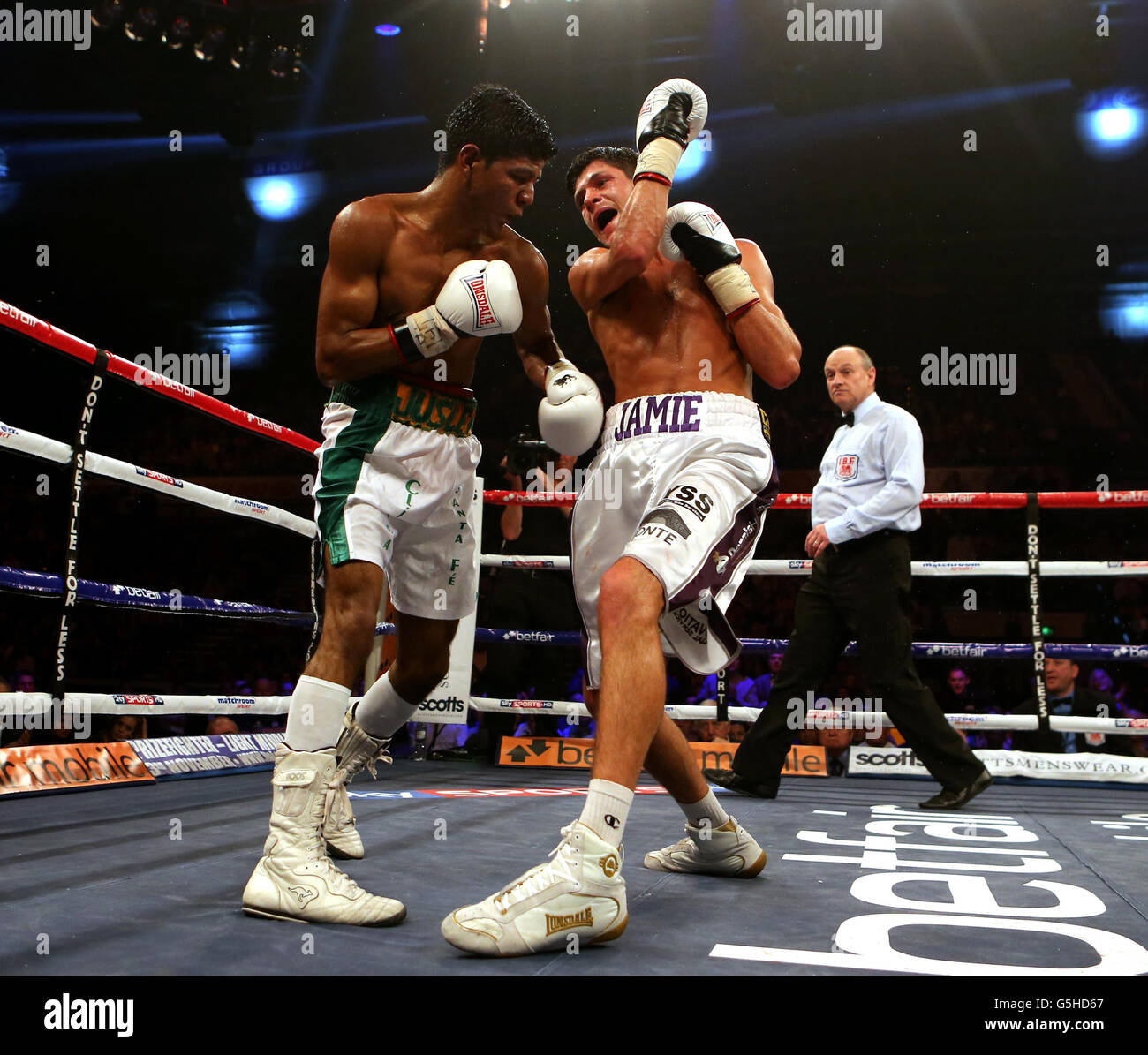 Jamie McDonnell (right) during his 8th round win over Darwin Zamora at the Motorpoint Arena, Sheffield. Stock Photo