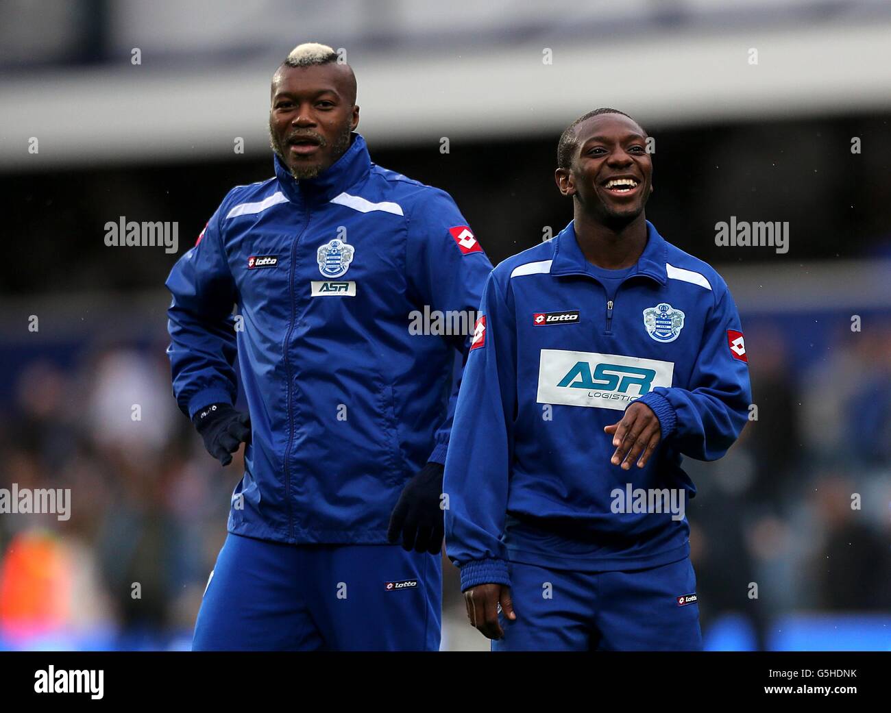 Queens Park Rangers' Djibril Cisse (left) and Shaun Wright-Phillips opt not to wear anti-rascism t-shirts during pre-match training Stock Photo