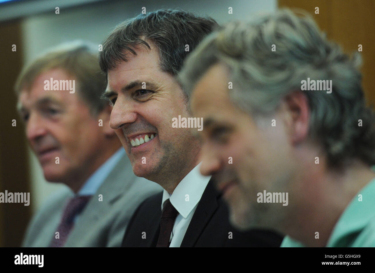(Left - right) Former Liverpool manager Kenny Dalglish, Steve Rotheram MP for Liverpool Walton and music producer Guy Chambers hold a press conference at the Houses of Parliament, London, to announce plans for a Hillsborough charity single to raise money for the families of Hillsborough victims' legal costs. The single, He ain't Heavy, He's My Brother, will go on sale on December 17. Stock Photo
