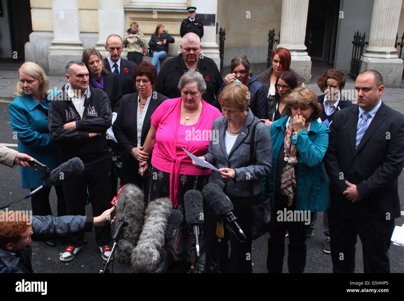 Bev Dawkins of Mencap reads a statement on behalf of the families who suffered abuse by 11 members of staff from the Winterbourne View care home who were caught on camera abusing severely disabled patients during an undercover BBC Panorama investigation at the South Gloucestershire private hospital. Stock Photo