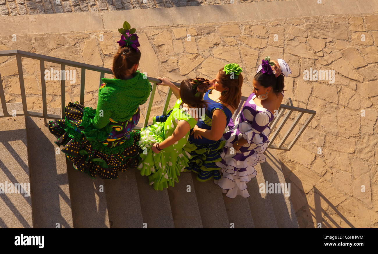 Four girls posing for a photo at the Cordoba Feria in 2011 Stock Photo