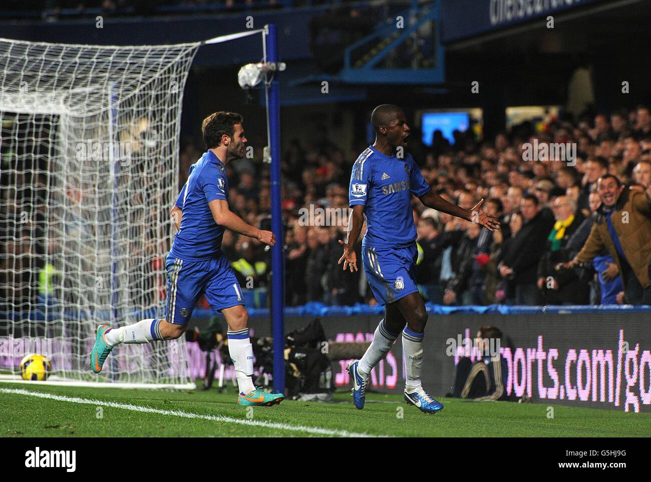 Chelsea's Nascimento Ramires celebrates scoring his side's second goal of the game with teammate Juan Mata (left) Stock Photo