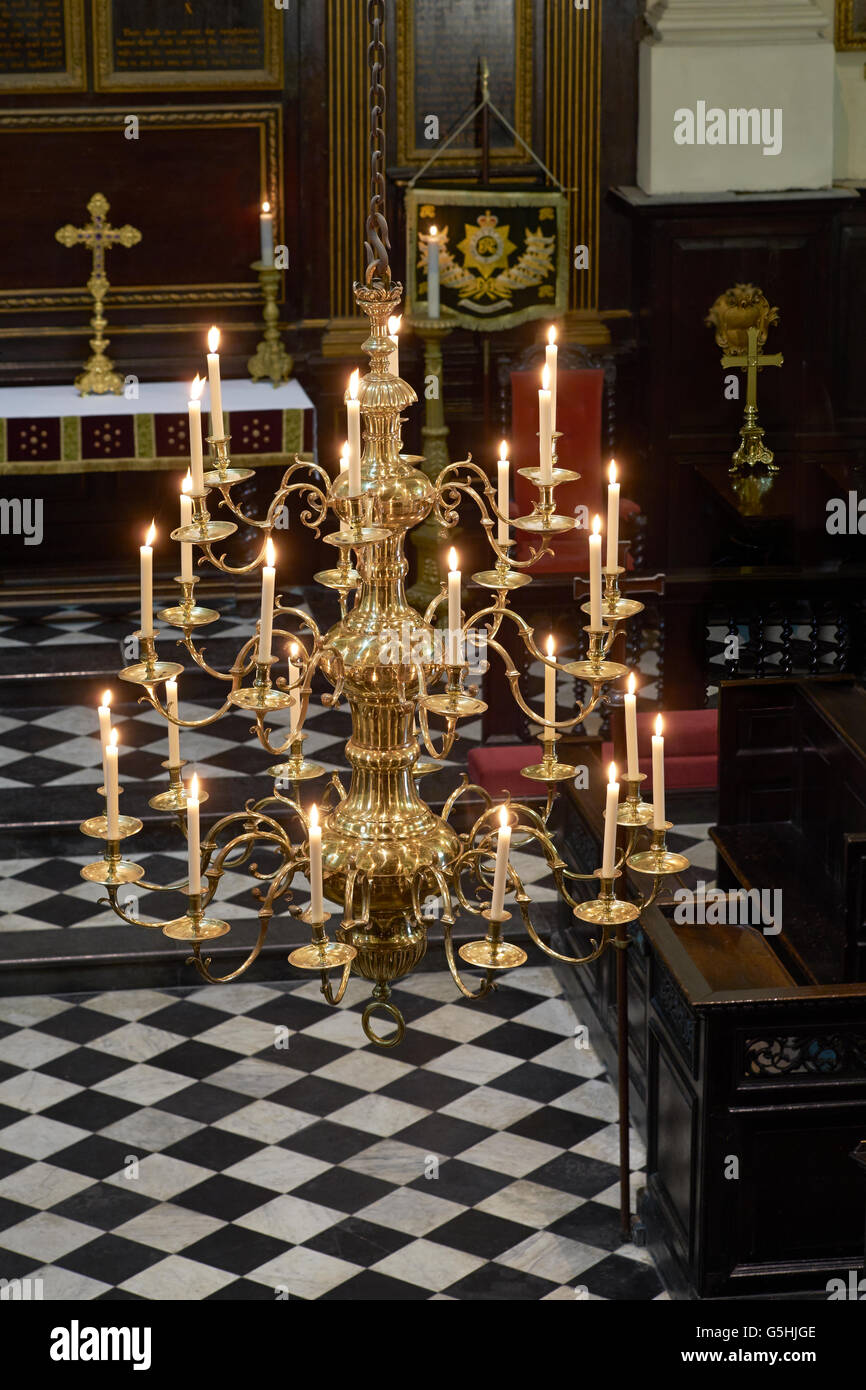 St Martin within Ludgate, church in the City of London, chandelier with lit candles Stock Photo