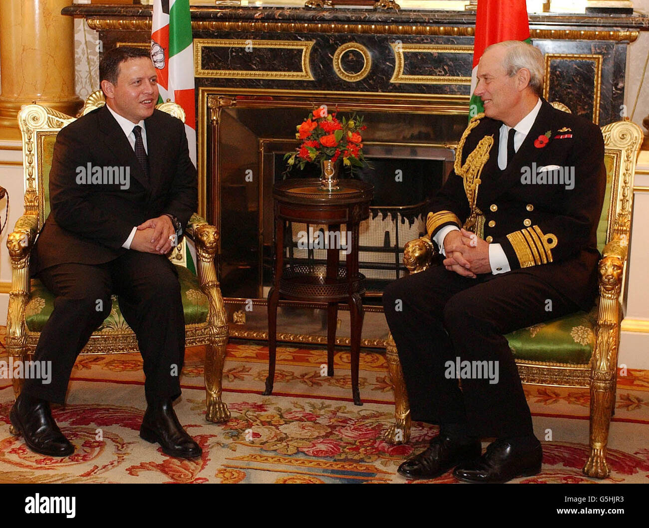 Chief of Defence Staff Admiral Sir Michael Boyce (right) talks with King Abdullah of Jordan at Buckingham Palace in central London. In Britain for a state visit, King Abdullah repeated his backing for continued military strikes against Afghanistan during Ramadan. Stock Photo