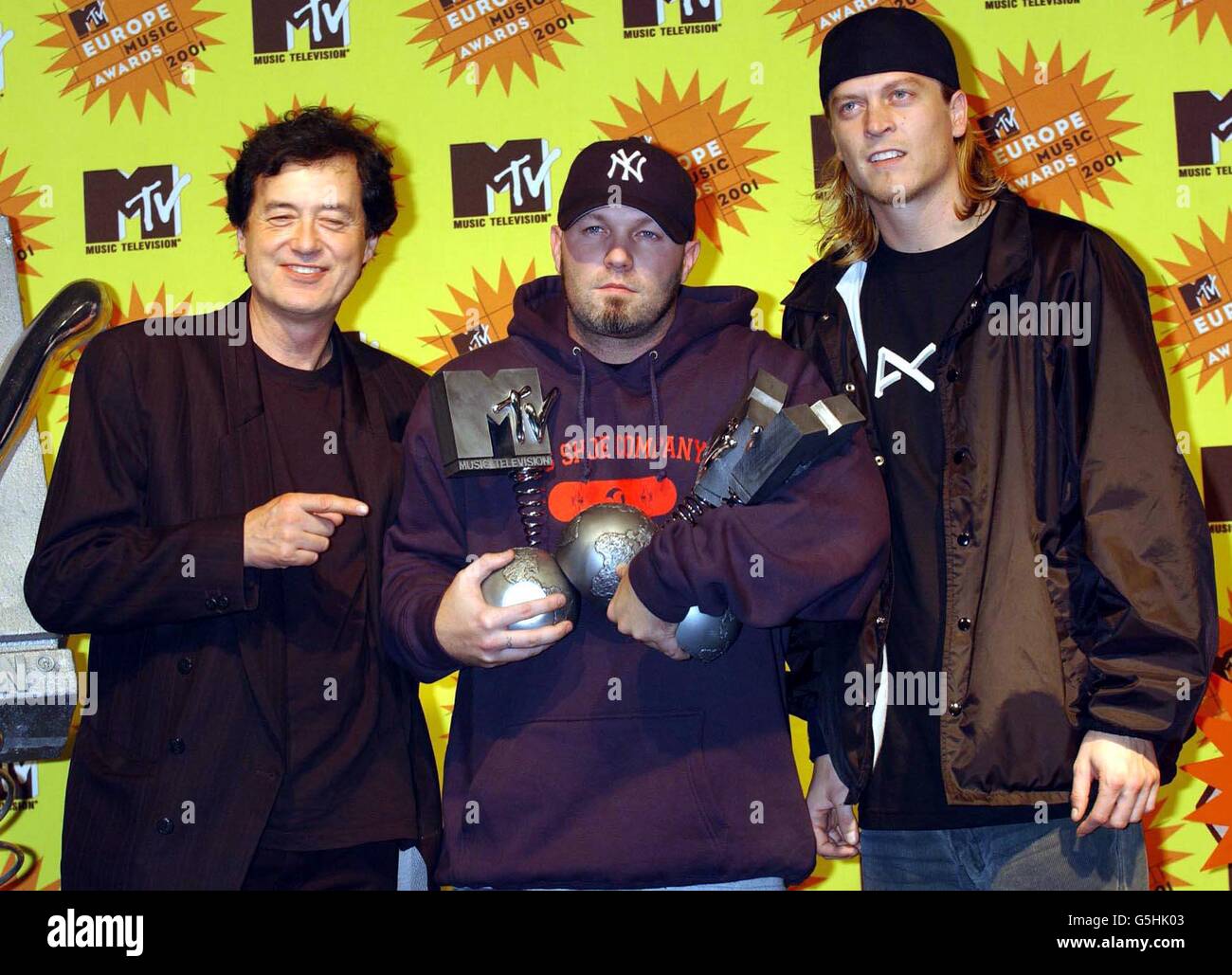 Fred Durst the lead singer with Limp Bizkit (C) with his awards for