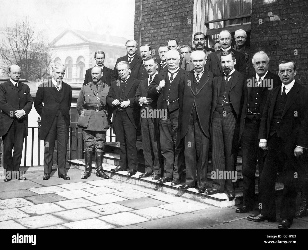 The first meeting of the Imperial War Cabinet at 10 Downing Street, which consisted of members from the British Cabinet and representatives of the Colonies and Dominions. Front row: (left to right) Walter Long, Sir Robert Border, Lt General Smuts, David Lloyd George, Sir James Meston, William Massey, Robert Rogers, George Perley, Arthur Balfour, Arthur Henderson, and Sir Maurice Hankie. Back row: (left to right) Andrew Bonar Law, John Douglas Hazen, Sir Joseph Ward, Austin Chamberlain, Edward Carson, Sir Ganga Singh and Lord Curzon. Stock Photo