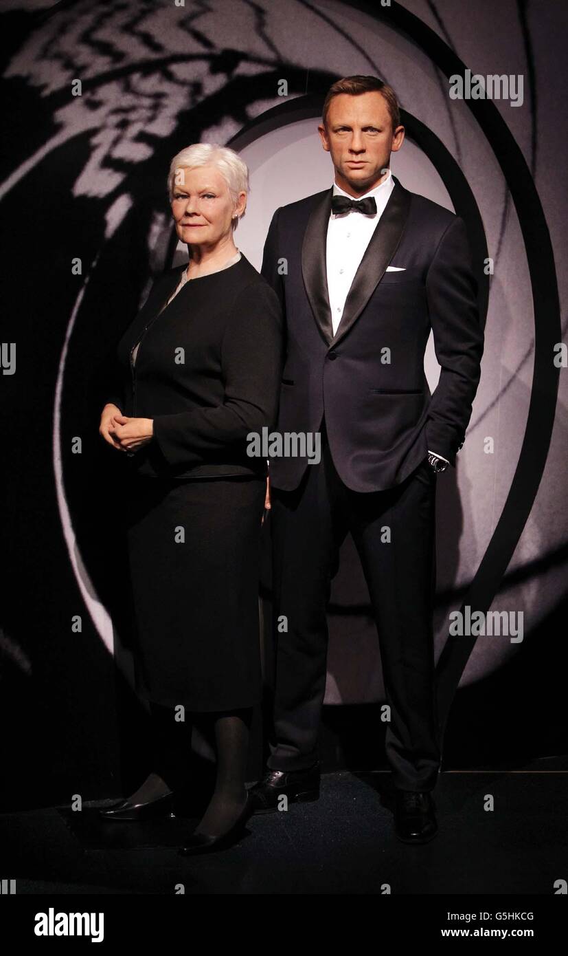 Skyfall wax works. Wax works of Daniel Craig and Judi Dench appear in a new 007 setting at Madame Tussauds, London. Stock Photo