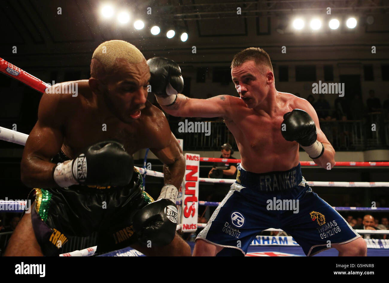 Frankie Gavin (right) in action against Junior Witter during there British Welterweight Title fight at York Hall, London. Stock Photo
