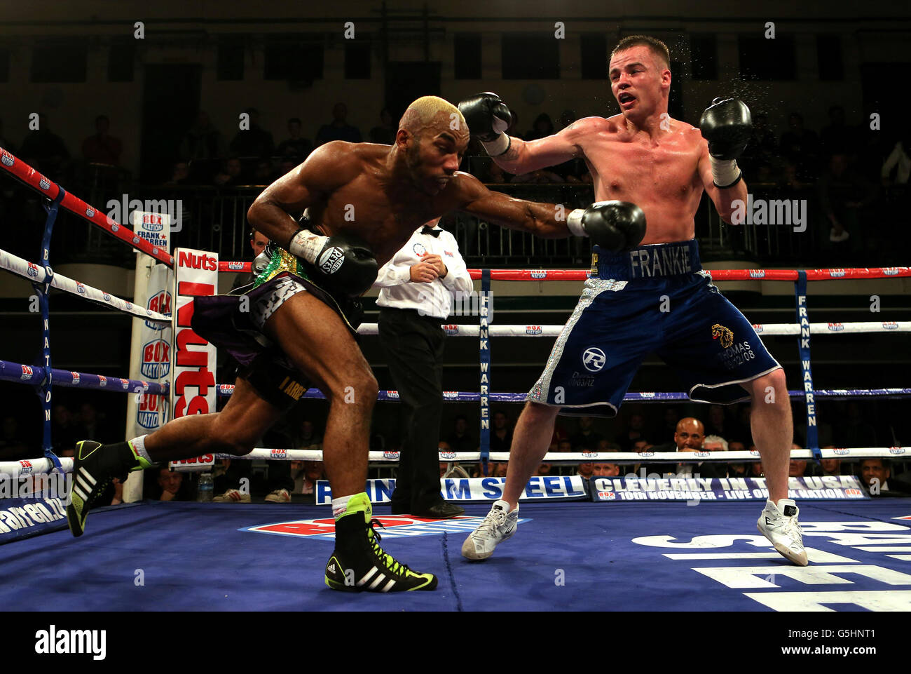 Junior Witter (left) in action against Frankie Gavin during there British Welterweight Title fight at York Hall, London. Stock Photo