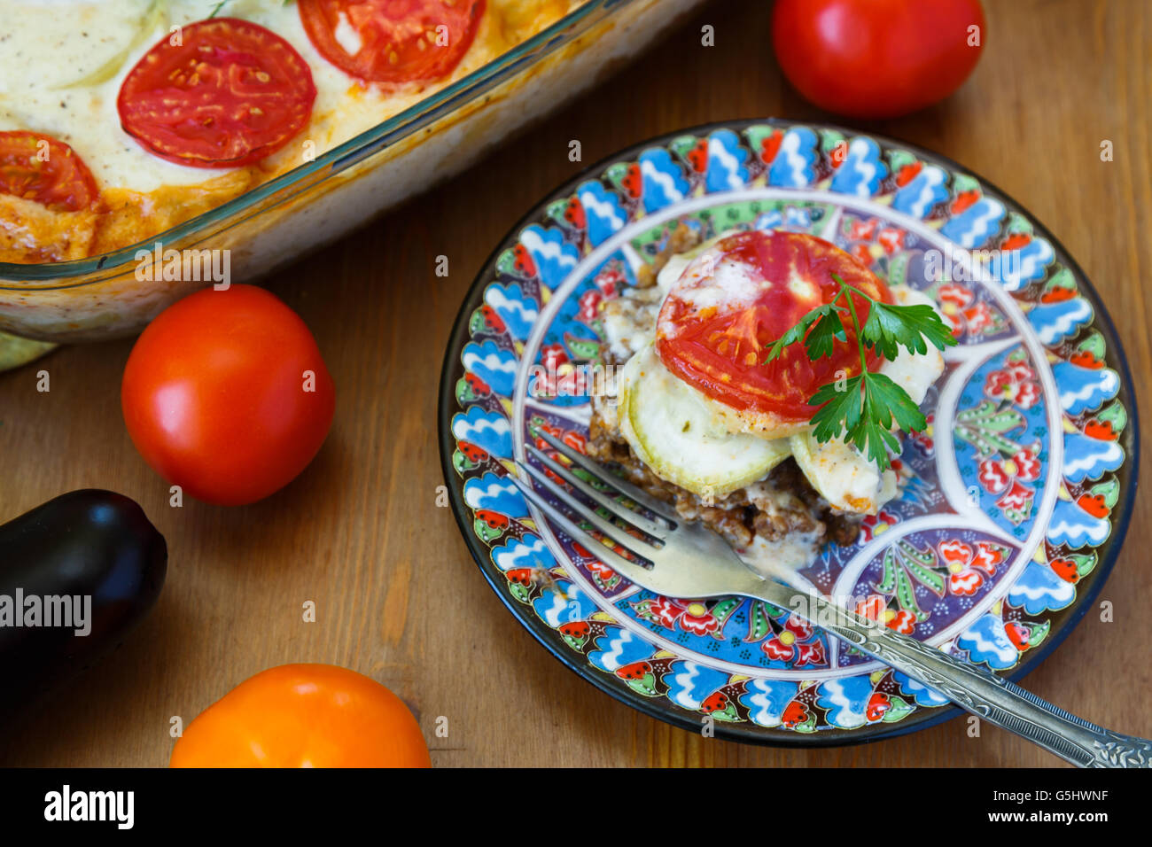 Moussaka on a plate with aubergine and tomato, traditional turkish meal Stock Photo
