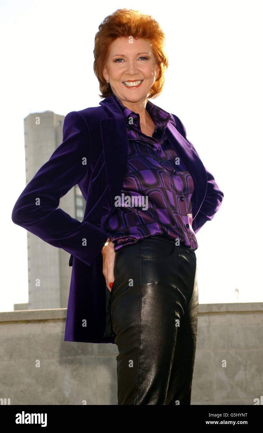 TV personality Cilla Black poses for photographs during the launch of a new series of her dating show 'Blind Date', on the balcony of the Dorchester Hotel in London. The show begins its new run on Saturday 10 November 2001 at 7pm on ITV. Stock Photo