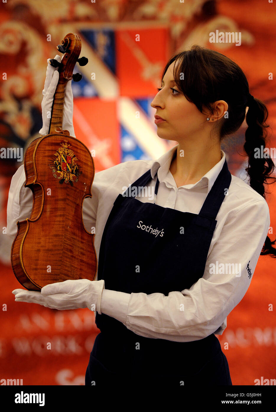 Sotheby's musical instrument sale Stock Photo Alamy