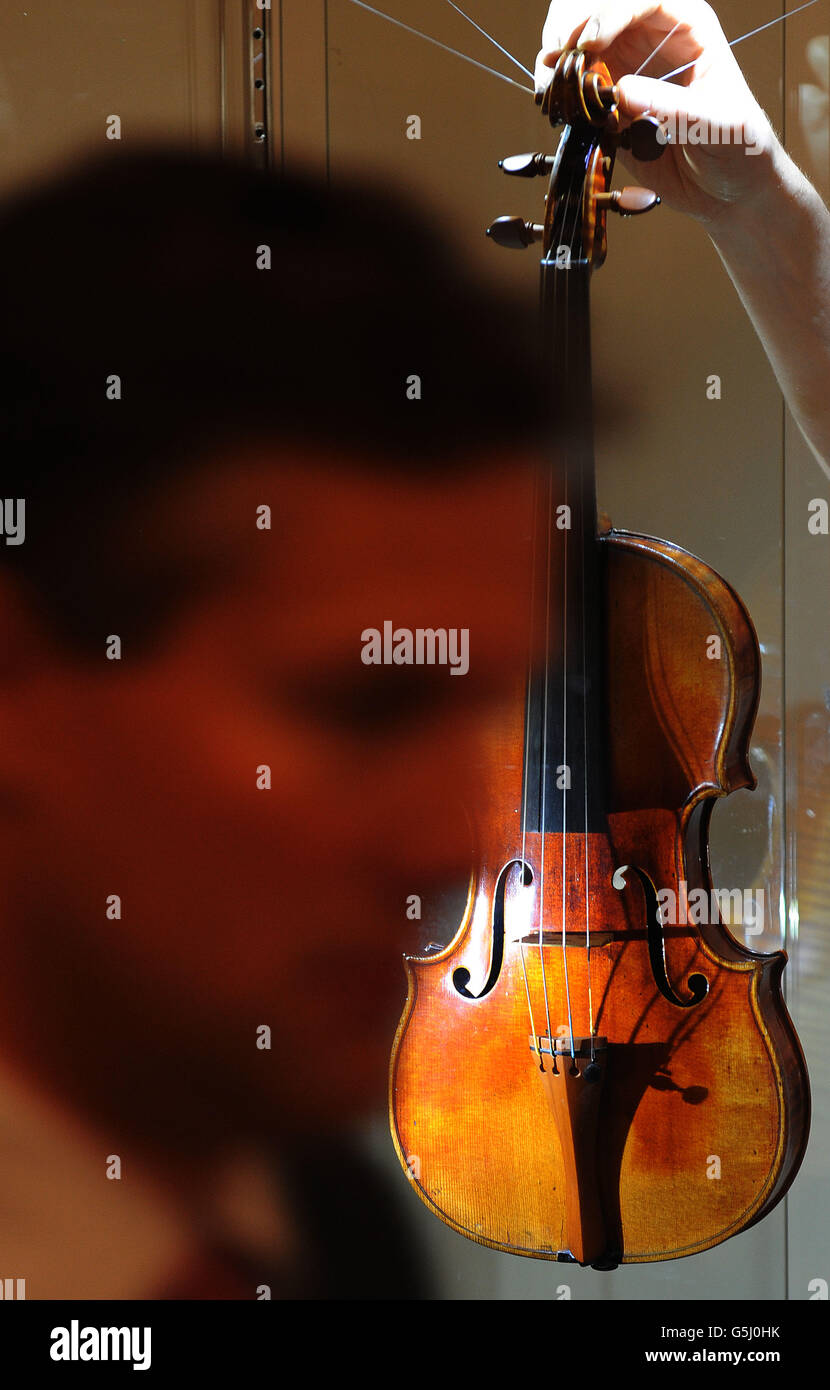 Sotheby's musical instrument sale Stock Photo Alamy