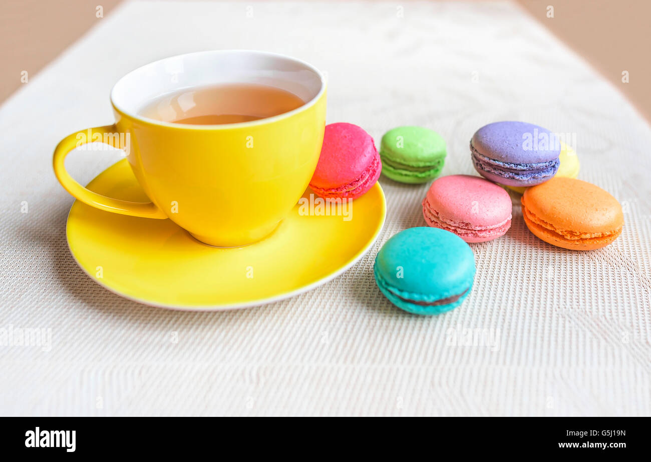 Cup of tea and macaroon on the table. Stock Photo