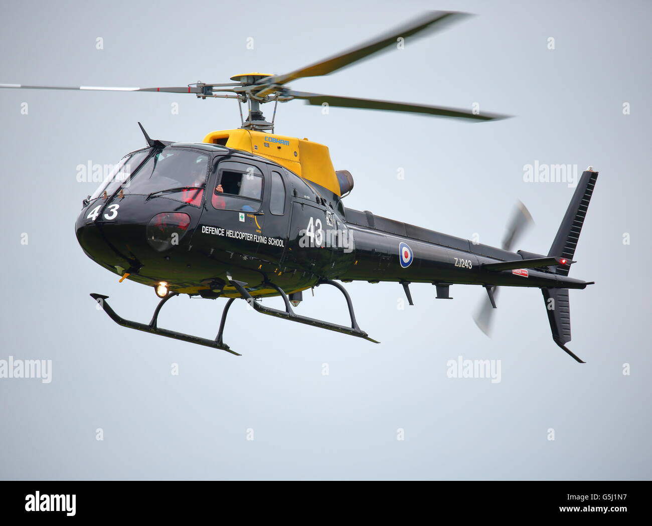 Eurocopter AS.350BB ZJ243 flying into RAF Cosford during the annual Air Show Stock Photo