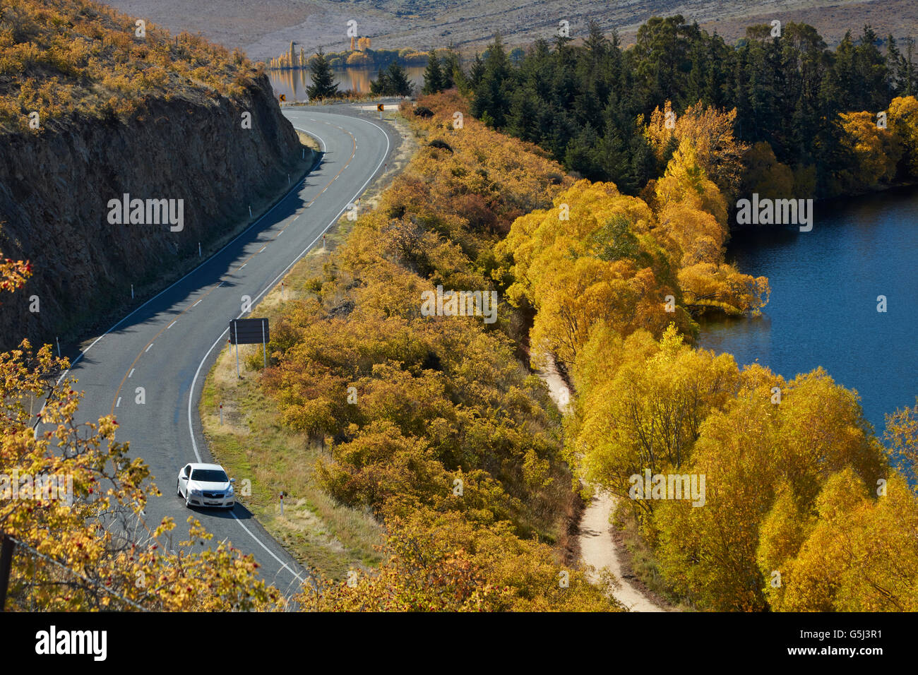 Lake Benmore, State Highway 83 and Alps to Ocean cycle trail in autumn, Waitaki Valley, North Otago, South Island, New Zealand Stock Photo