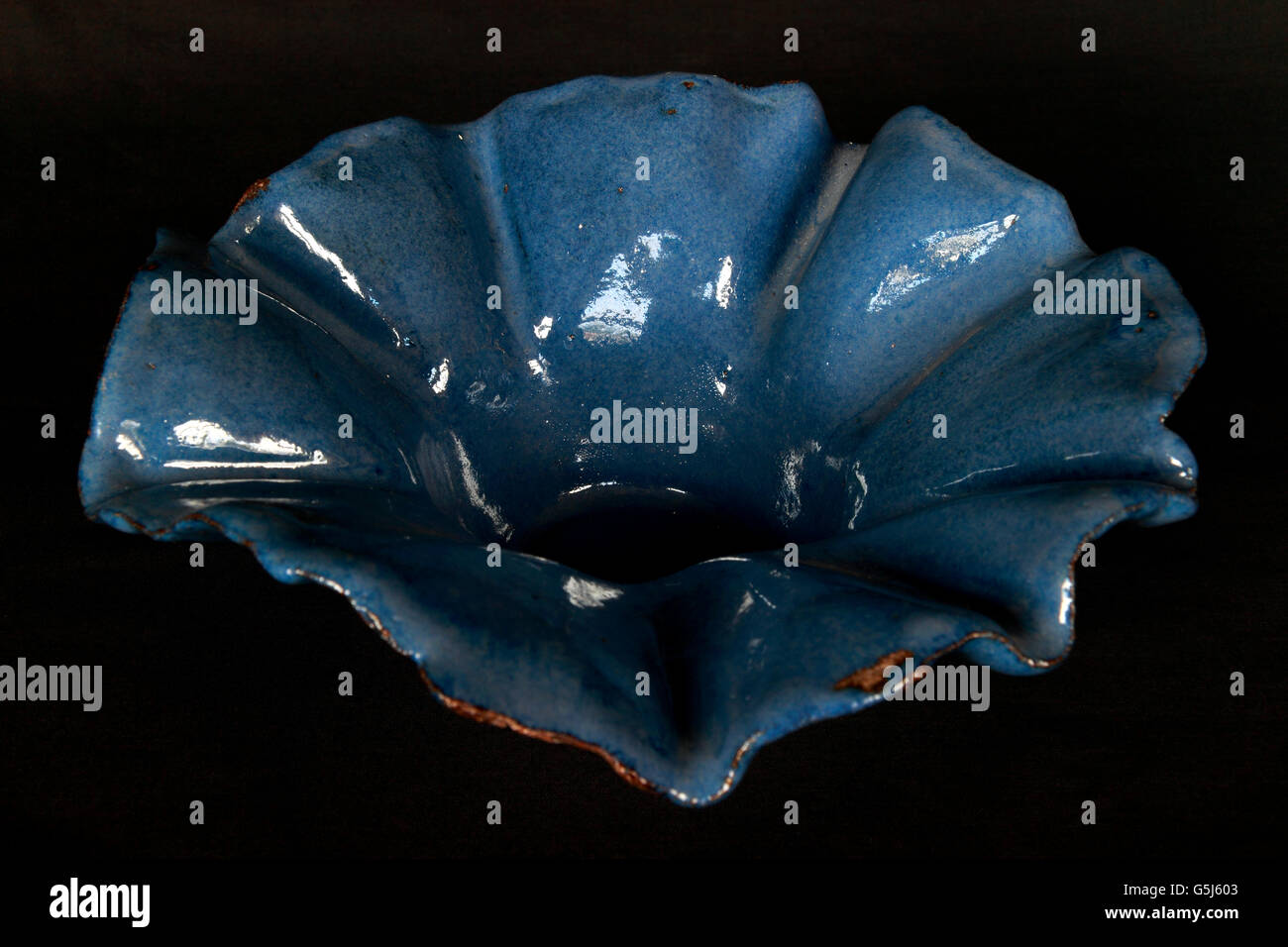 Ceramic pot pottery blue glazed fluted bowl Stock Photo Alamy