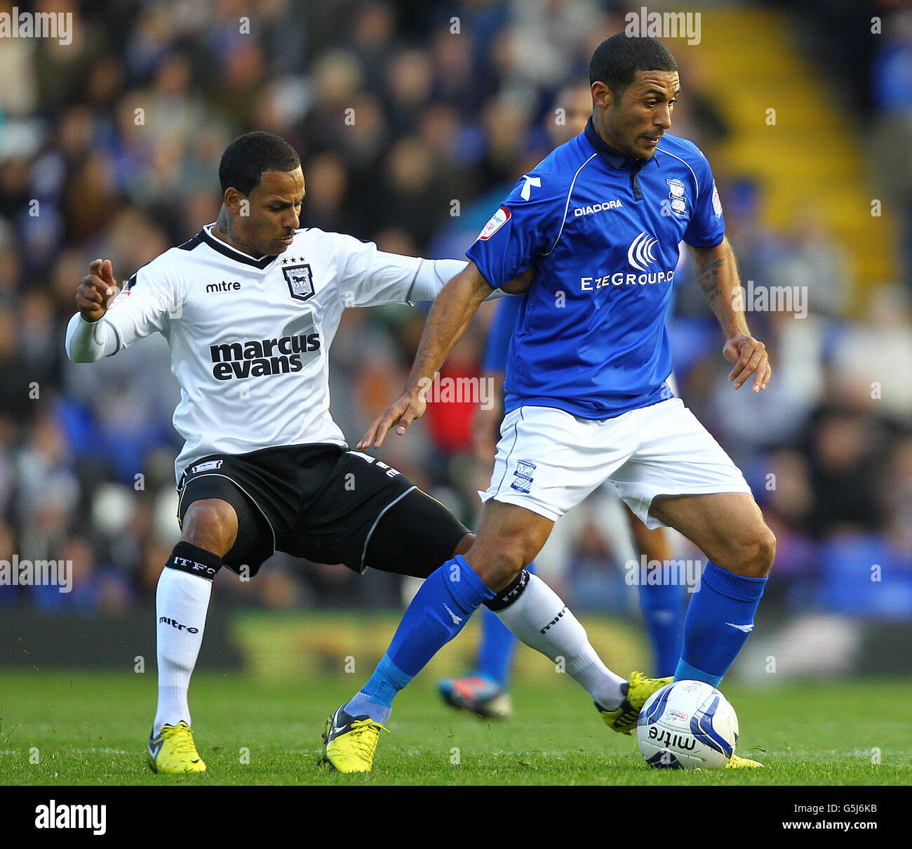 Birmingham's Hayden Mullins and Ipswich Town's goal scorer D J Campbell during the npower Football League Championship match at St Andrews, Birmingham. Stock Photo