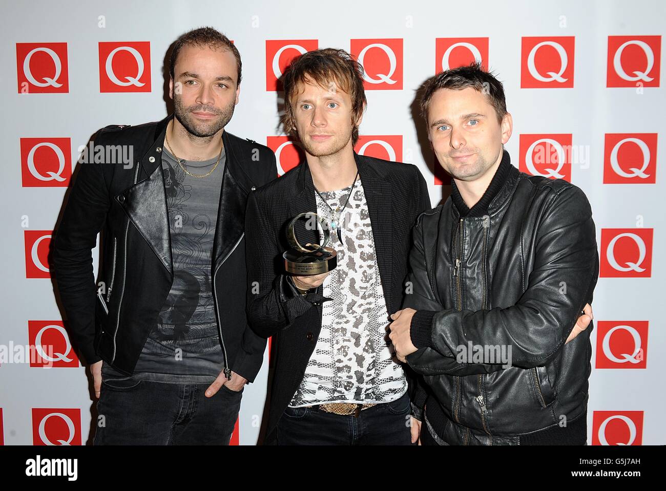 Dominic Howard, Dominic Howard and Matthew Bellamy with the The Best Act In The World Today award at the 2012 Q Awards at the Grosvenor House Hotel, Park Lane, London Stock Photo
