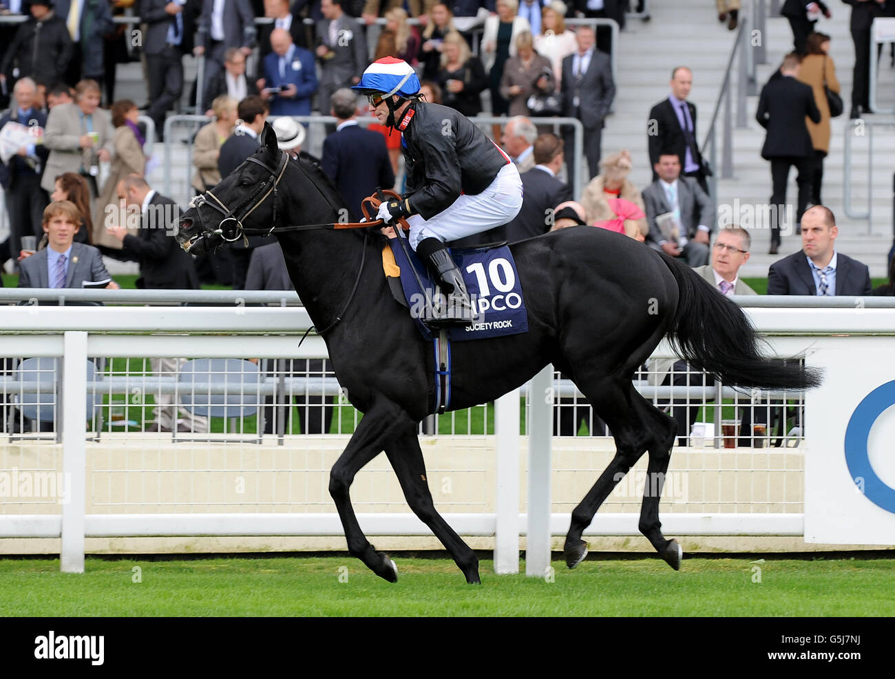 Society Rock ridden by jockey Kieren Fallon goes to post for the Qipco British Champions Sprint Stakes Stock Photo