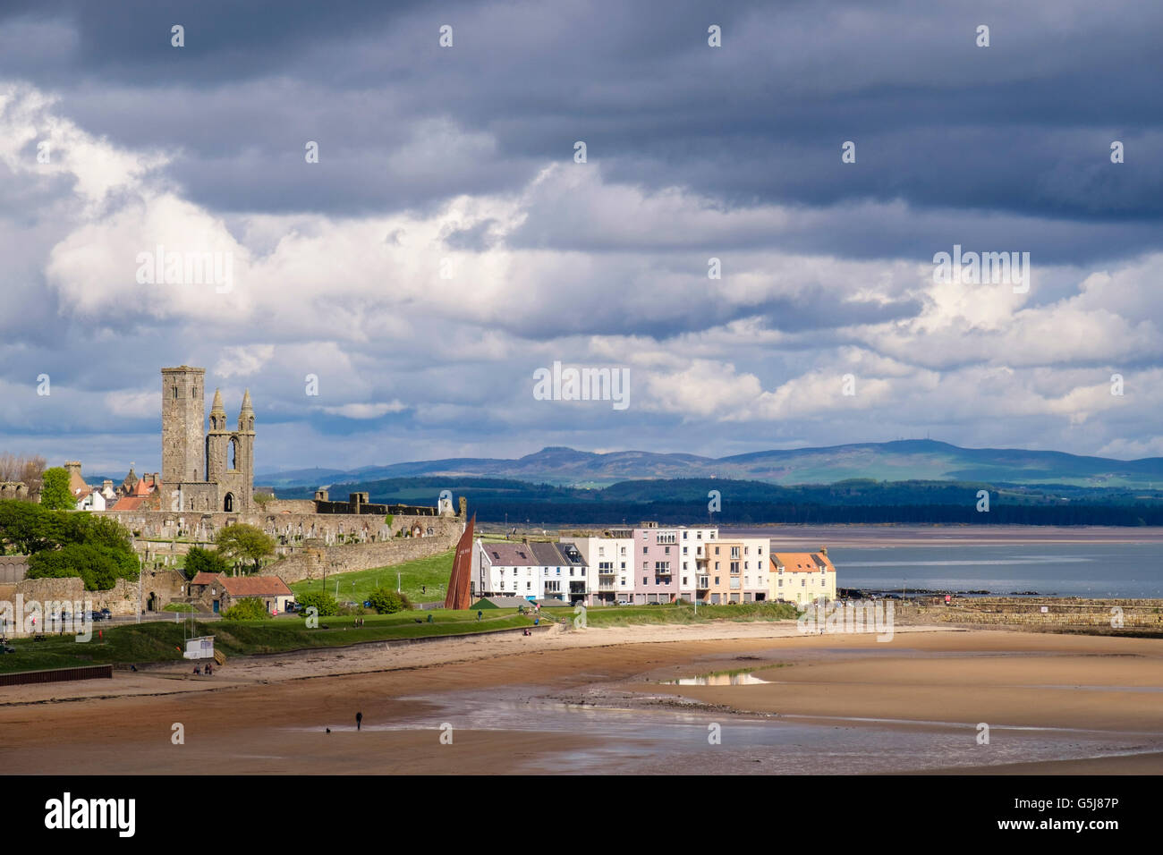 View across East Sands beach to town harbour and Cathedral ruins in Fife east coast town. Royal Burgh St Andrews Fife Scotland UK Britain Stock Photo