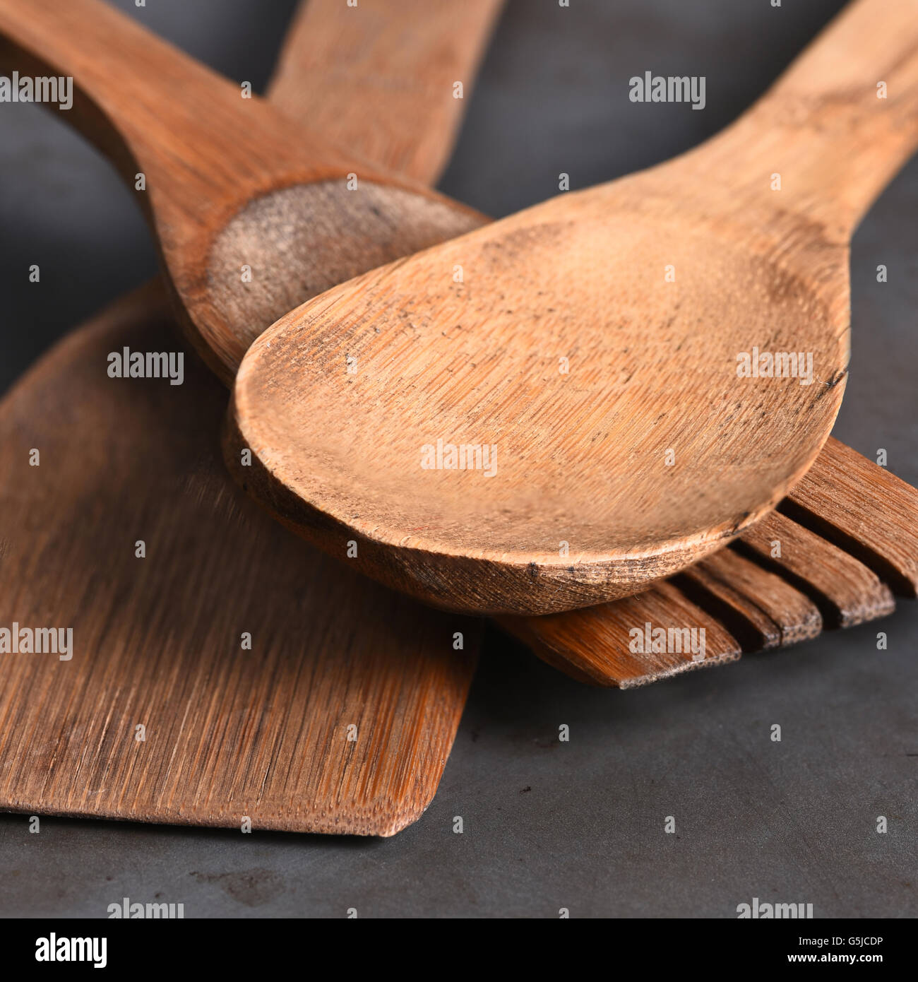 Closeup of a group of wood kitchen utensils. Stock Photo