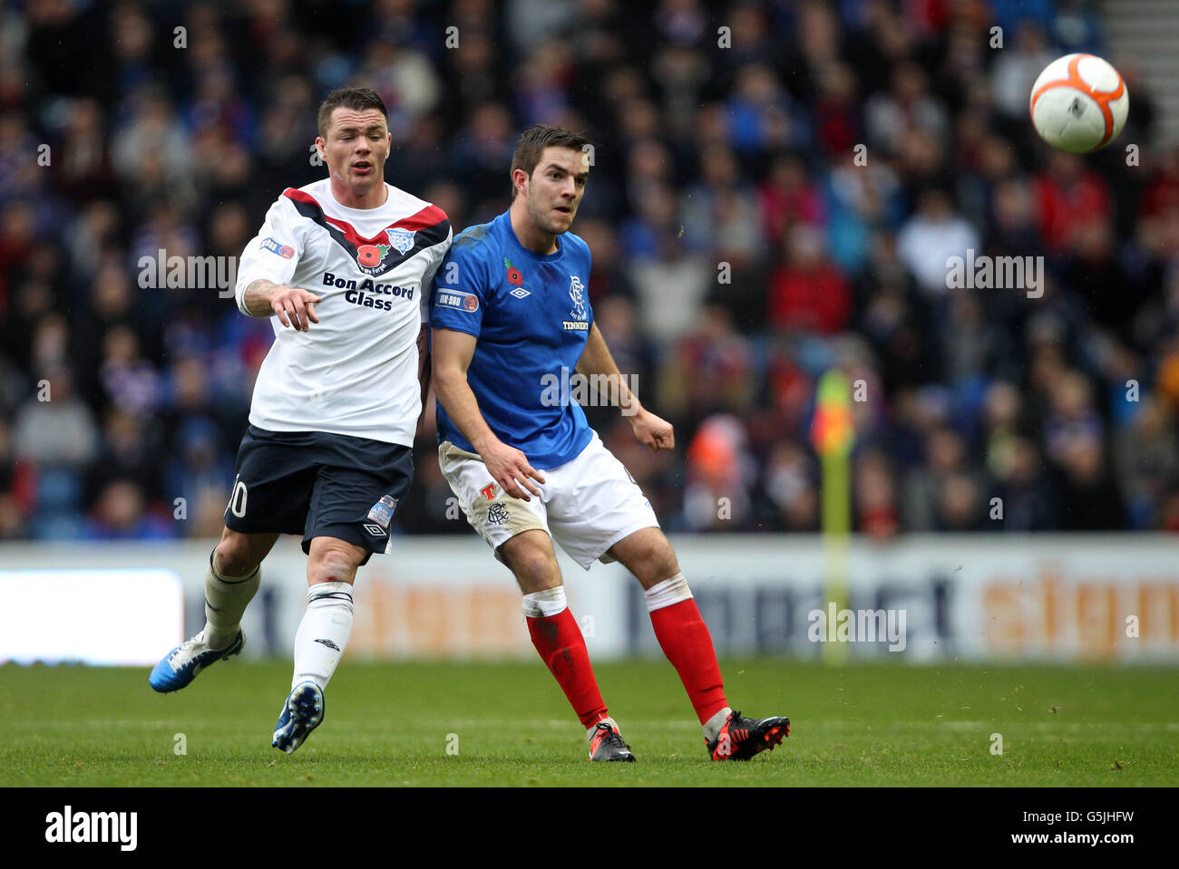 Ranger's Andy Little and Peterhead's David Cox during the Irn Bru ...
