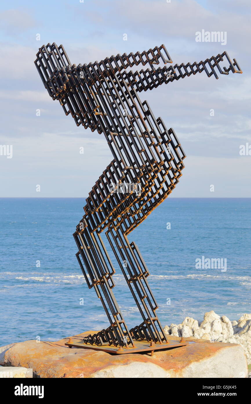 Modern sculpture titled 'Love Alone' by George Holloway on the Hermanus cliffs in South Africa Stock Photo