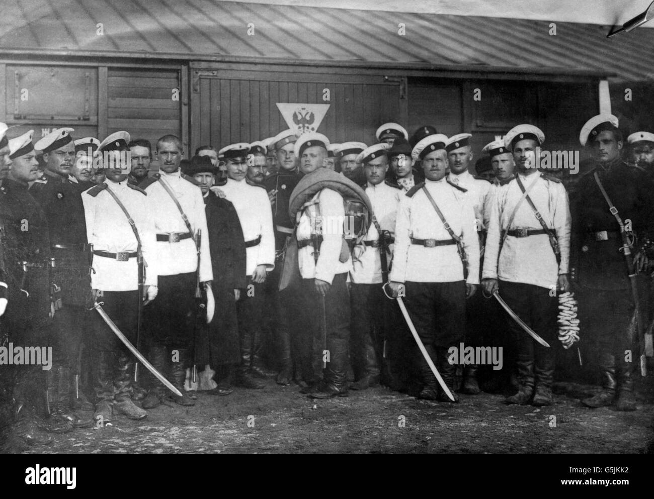 Russian troops in Galicia, Spain. The flat cakes carried on a skewer (right) are known as 'Ivan Ivanoff's backbone.' Stock Photo