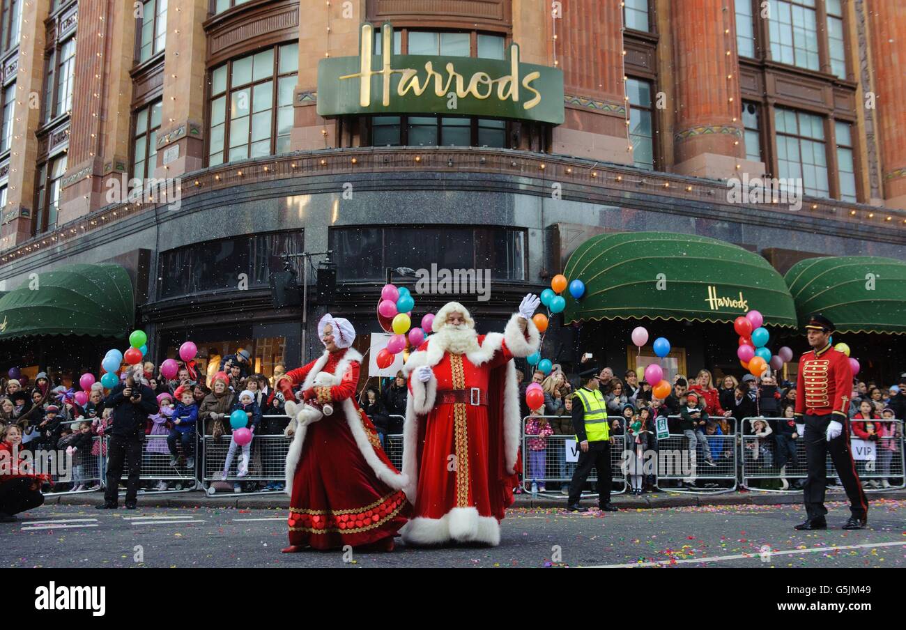 Performers take part in the annual Harrods Christmas Parade outside